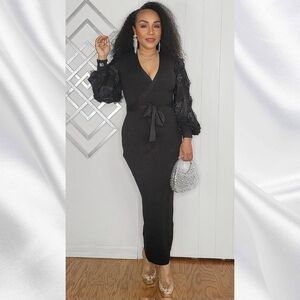 Elegant Black Sweater Dress with Sheer Sleeves